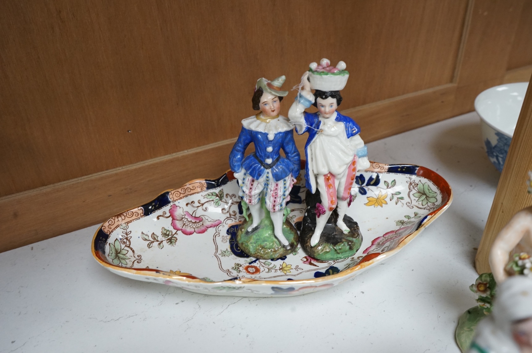 Four 19th century Continental porcelain figures and two Derby style figures, largest 19cm high